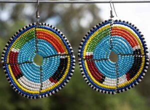 Circular shaped mixed maasai beaded earring fixed with wires & a circular hole in the middle.