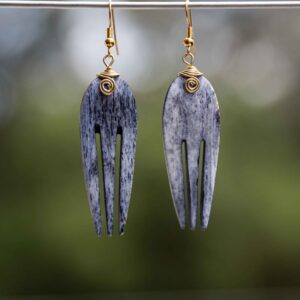 Grey comb shaped bone with brass wire hooks earring.